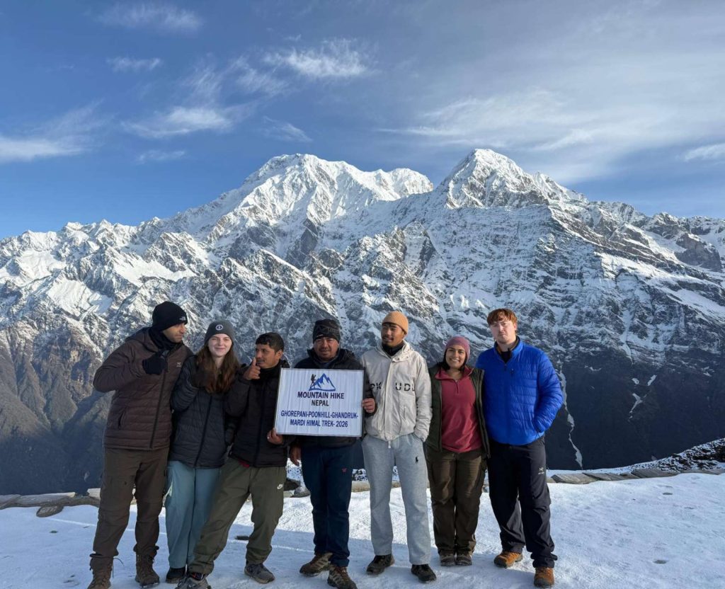 American trekkers during the Mardi Himal Trek with snowy Himalayan mountain views in Nepal