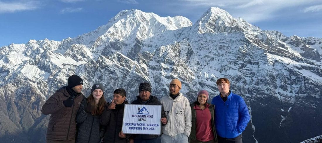 American trekkers during the Mardi Himal Trek with snowy Himalayan mountain views in Nepal
