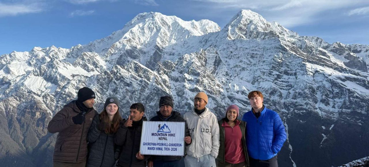 American trekkers during the Mardi Himal Trek with snowy Himalayan mountain views in Nepal