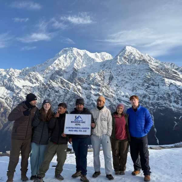 American trekkers during the Mardi Himal Trek with snowy Himalayan mountain views in Nepal