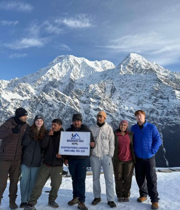 American trekkers during the Mardi Himal Trek with snowy Himalayan mountain views in Nepal
