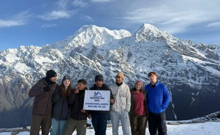 American trekkers during the Mardi Himal Trek with snowy Himalayan mountain views in Nepal