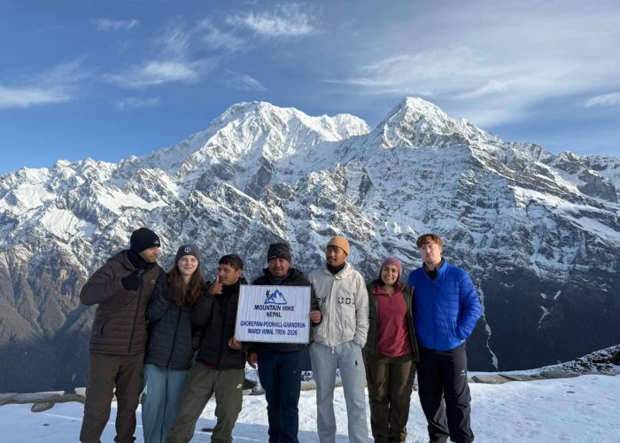 American trekkers during the Mardi Himal Trek with snowy Himalayan mountain views in Nepal