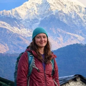 Solo female trekker in Annapurna region Nepal with mountain view