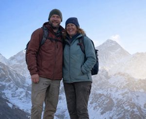 Couple trekking in the Everest Gokyo region Couple trekking together with Himalayan mountain views during Everest Gokyo Lakes Trek