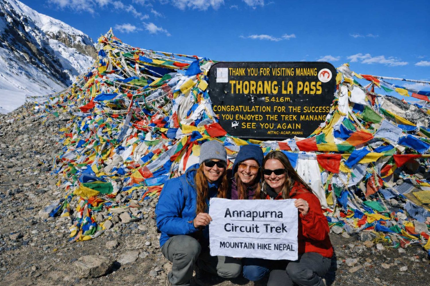 Trekkers at Thorong La Pass on the Annapurna Circuit Trek