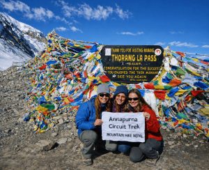 Thorong La Pass – Annapurna Circuit Trek Trekkers at Thorong La Pass on the Annapurna Circuit Trek