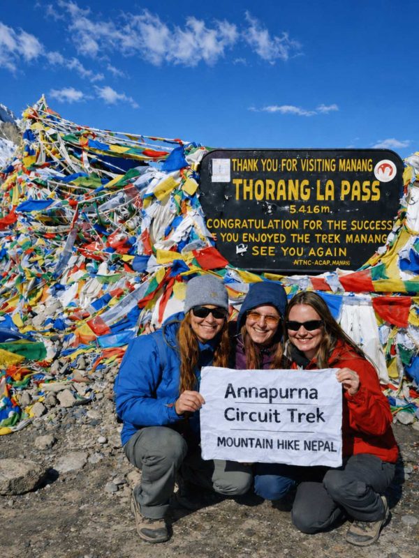 Trekkers at Thorong La Pass on the Annapurna Circuit Trek