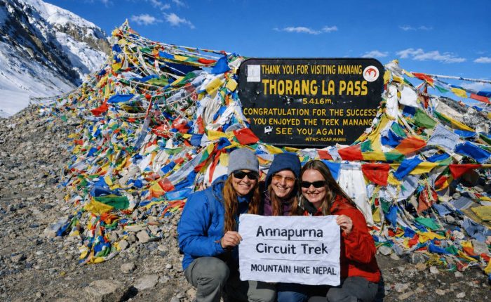 Trekkers at Thorong La Pass on the Annapurna Circuit Trek