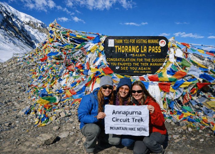 Trekkers at Thorong La Pass on the Annapurna Circuit Trek