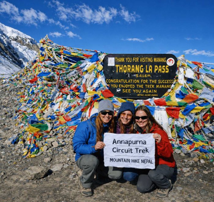 Trekkers at Thorong La Pass on the Annapurna Circuit Trek
