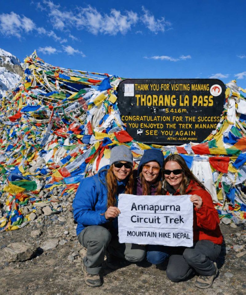 Trekkers at Thorong La Pass on the Annapurna Circuit Trek