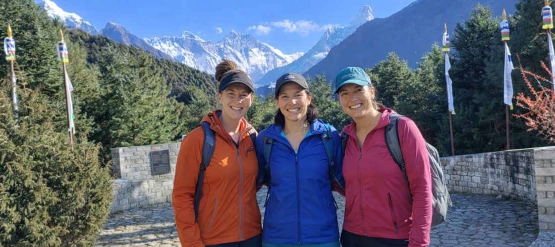 Trekkers enjoying a clear day in the Everest region of Nepal during a guided Himalayan trek