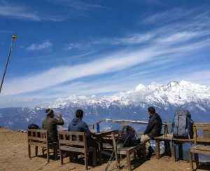Langtang Helambu Circuit Trek Himalayan View Trekkers resting with a wide Himalayan mountain view on the Langtang Helambu Circuit Trek