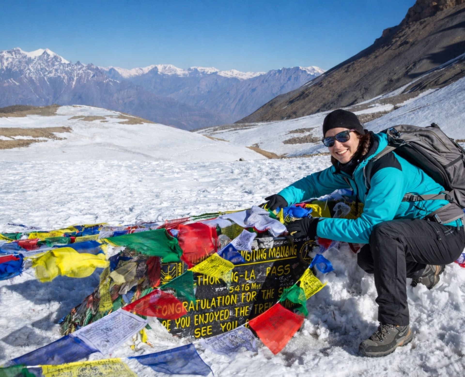 Trekker at Thorong La Pass during Annapurna Circuit Trek Cost adventure in Nepal