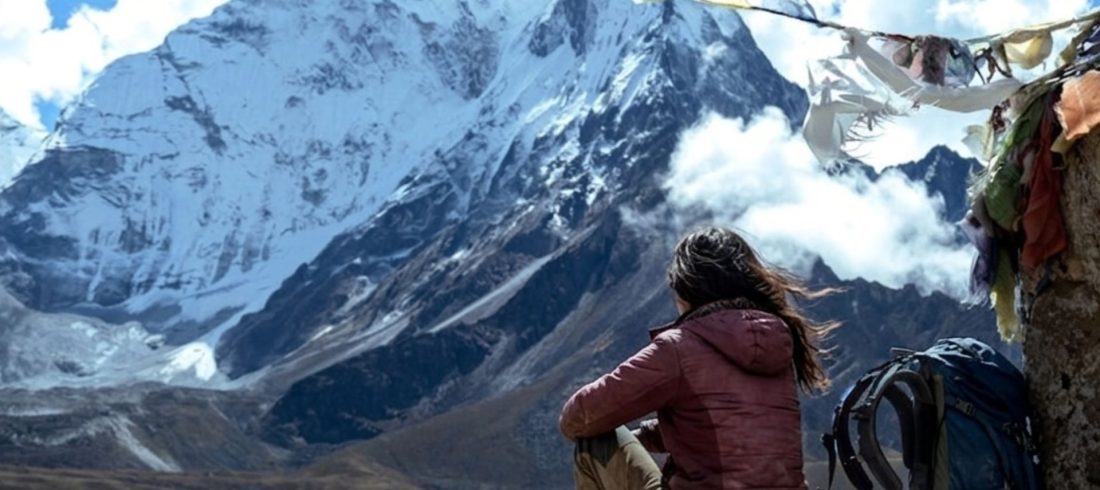 Trekkers enjoying clear mountain views during the best time Everest Base Camp Trek in Nepal with snow-capped Himalayan peaks in the background.