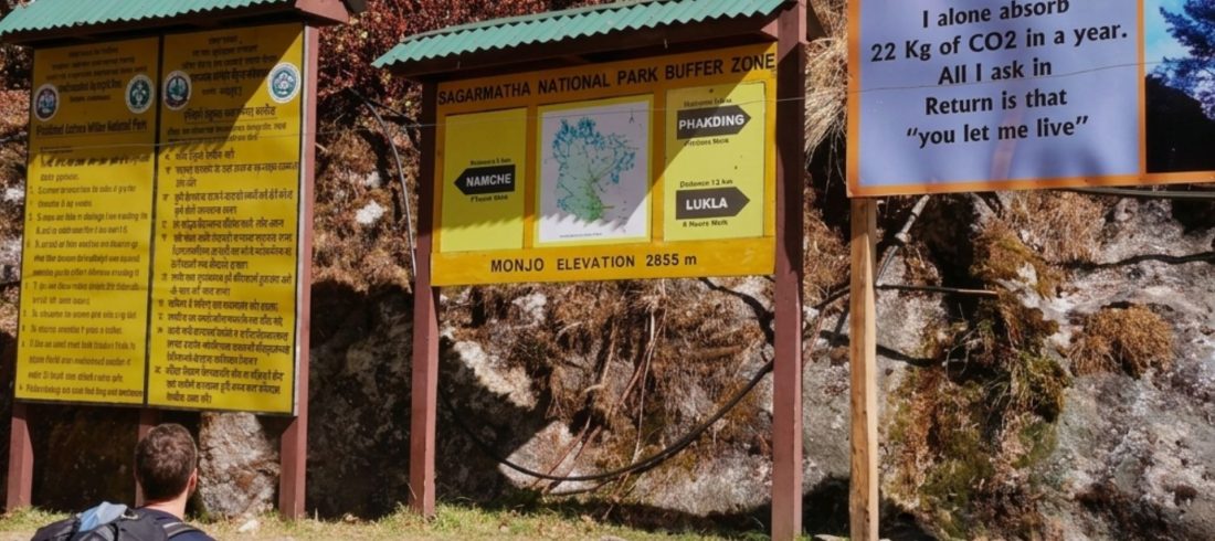 Everest Base Camp permit checkpoint at Monjo — trekkers entering Sagarmatha National Park in the Khumbu region