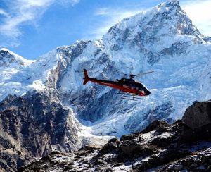 High-Altitude Glacier Flight Helicopter flying above the Khumbu Glacier and Himalayan peaks