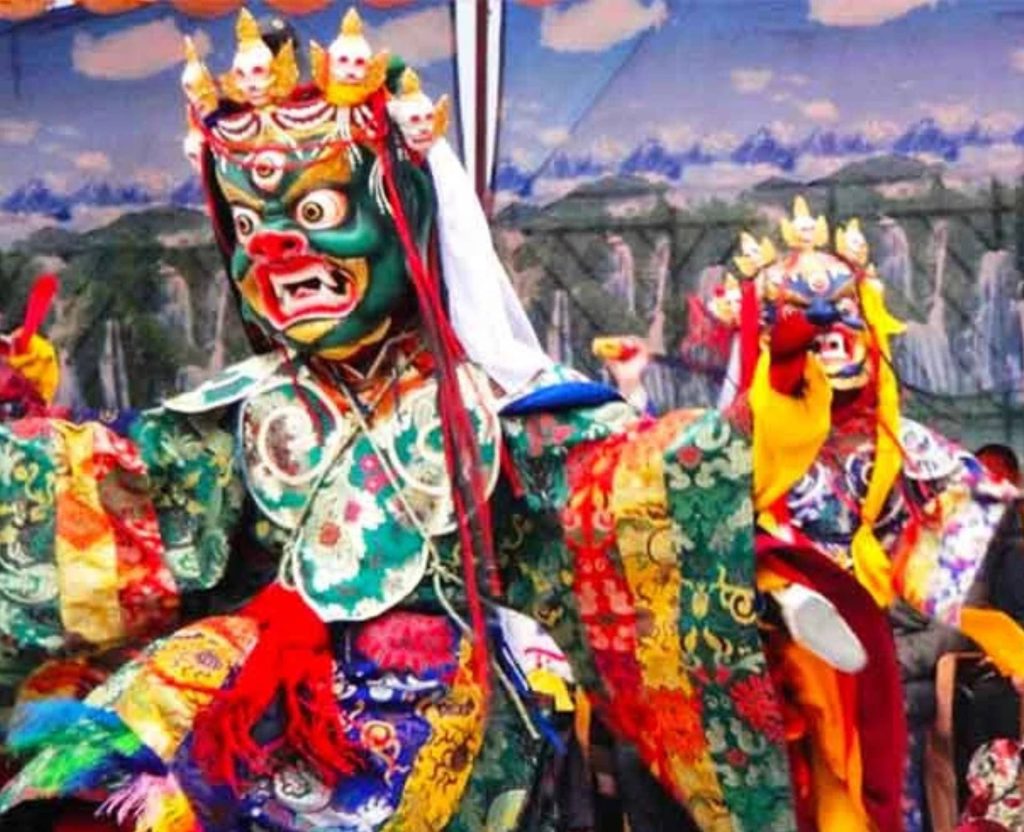 colorful masked dancer at Tiji Festival in Upper Mustang Nepal