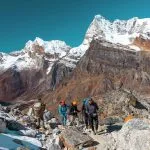 International trekkers hiking in the Nepal Himalayas, reflecting growing Nepal tourist arrivals and increasing demand for trekking adventures.