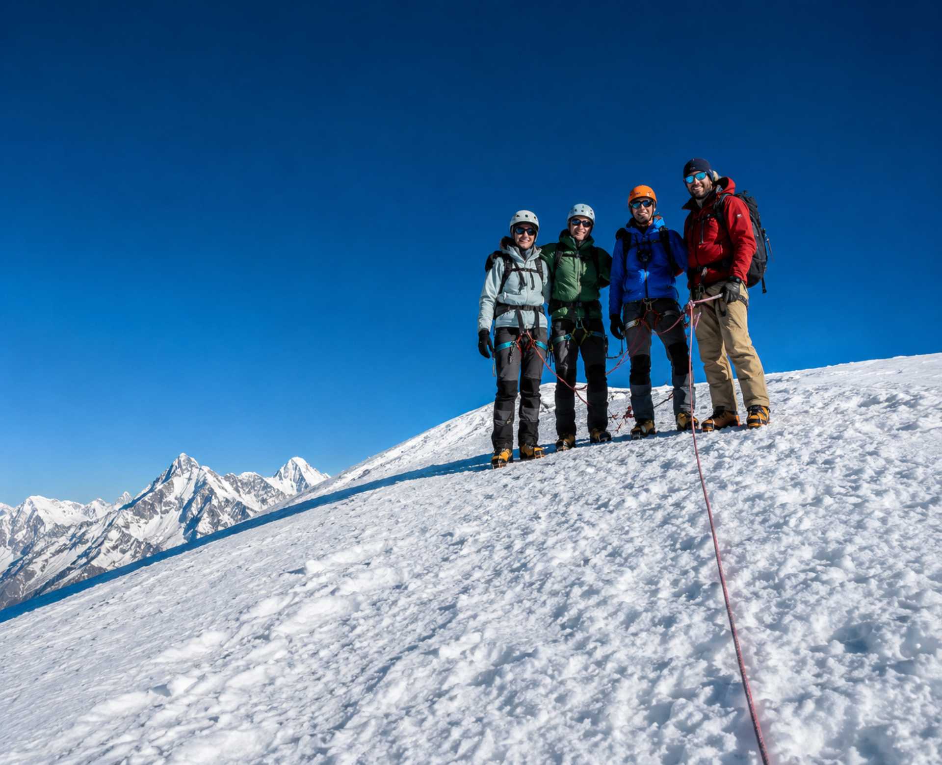 Climbers on the snowy slopes of Yala Peak in Langtang National Park, Nepal.