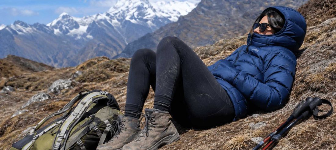 Early Signs Altitude Sickness in a trekker resting during a Himalayan trek.