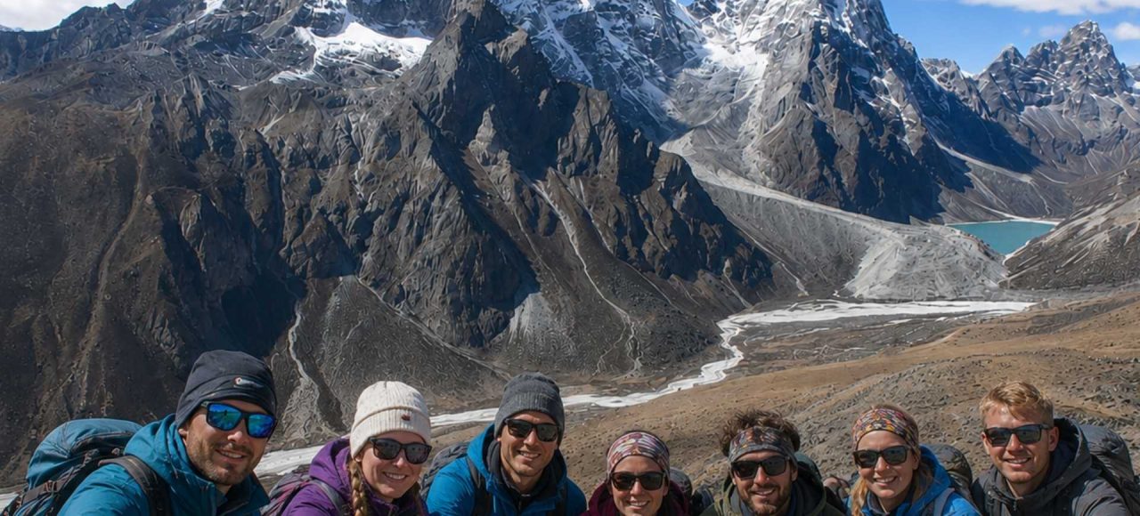 Trekkers enjoying the panoramic mountain views during the Nangkartshang Peak Trek in Nepal's Everest region.