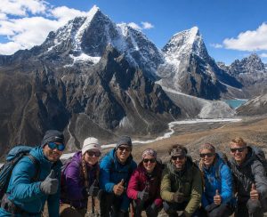 Trekkers enjoying the panoramic mountain views during the Nangkartshang Peak Trek in Nepal's Everest region.