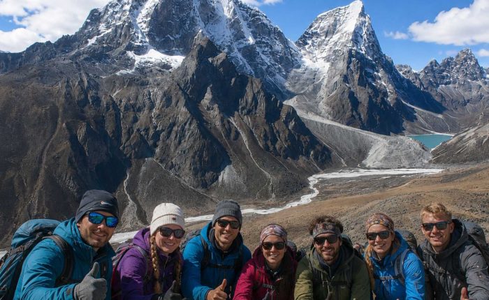 Trekkers enjoying the panoramic mountain views during the Nangkartshang Peak Trek in Nepal's Everest region.