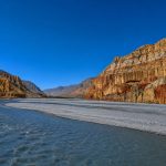 Kali Gandaki valley in Upper Mustang, Nepal with red cliffs and river