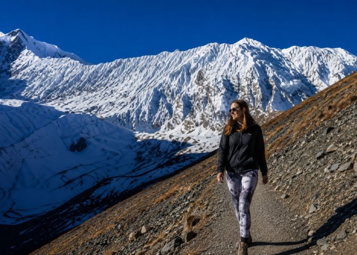 Woman hiking on the Annapurna Circuit Tilicho Trek