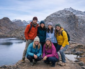 Trekkers in the Langtang Region Group of trekkers beside a mountain lake in Langtang