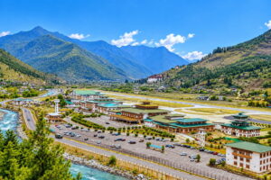 Paro International Airport – Gateway to Bhutan from Kathmandu Paro International Airport in Bhutan surrounded by mountains and the Paro Valley.