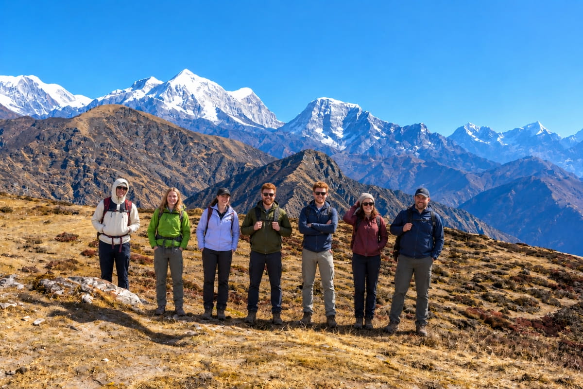 Group of seven hikers on a Himalayan ridge during the Pikey Peak Trek in Nepal