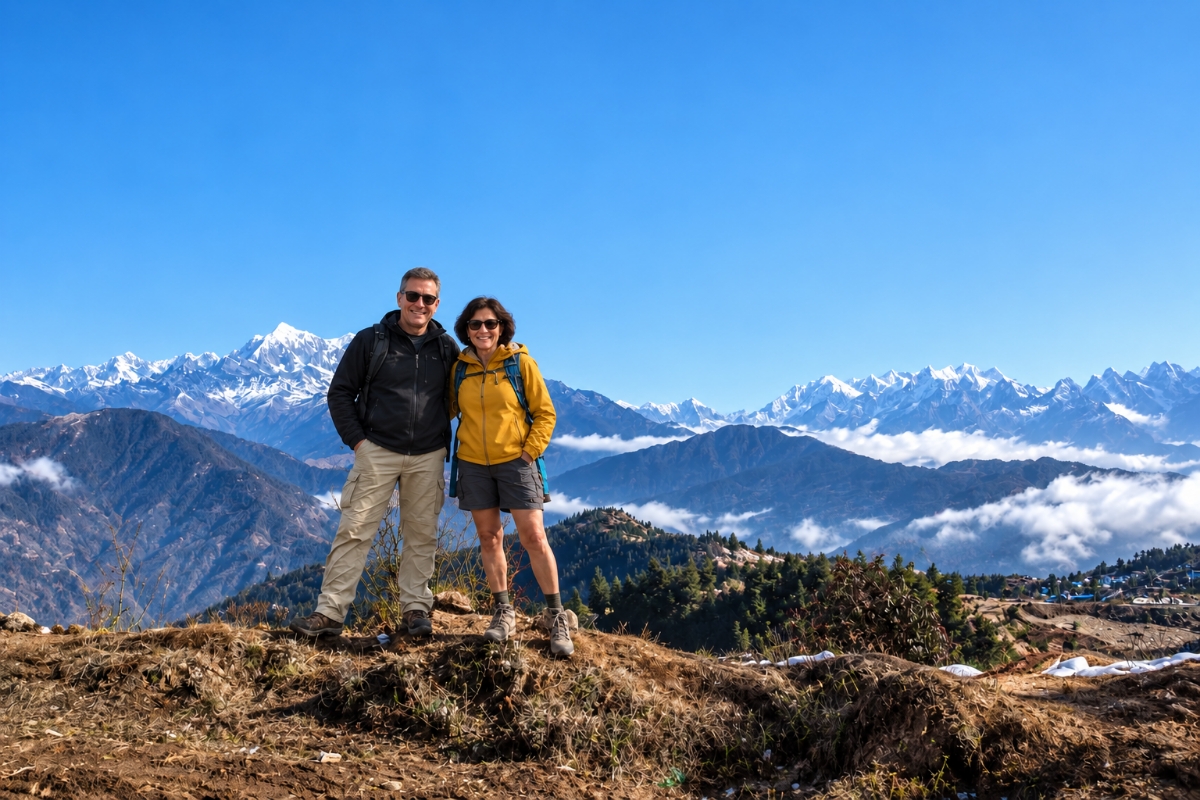 Two trekkers enjoying Himalayan views on the Pikey Peak Trek in Nepal
