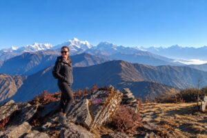 Pikey Peak Trek Ridge and Numbur Himal View Hiker on the Pikey Peak ridge trail with Numbur Himal in the background