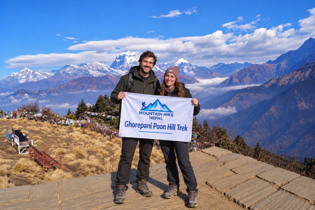 Trekkers at Poon Hill with Annapurna mountain views in Nepal