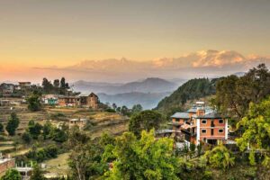 Bandipur at Sunrise, Nepal Road Trip Bandipur village on its ridge at sunrise, with terraced fields below and the Himalaya behind