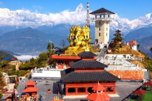 Panchmukhi Ganesh, Sarangkot The golden five-faced Ganesh statue at Sarangkot, with Machhapuchhre and the Annapurna range behind