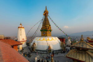 Swayambhunath Stupa, Kathmandu Swayambhunath Stupa with its gold spire, painted eyes and prayer flags, above Kathmandu city